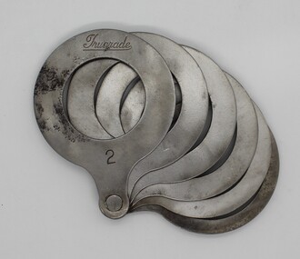 Equipment, "Trugrade" apple sizing ring