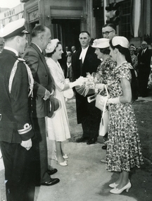 Photograph, The Age, Proclamation of the City of Ringwood, 19 March, 1960 - L-R: Officer, State Governor Sir Dallas Brooks and Lady Brooks, Town Clerk Cr. F. Dwerryhouse, Mayoress Mrs. Lavis presenting bouquet to Lady Brooks, Mayor Albert Lavis, Mrs. Dwerryhouse, 1960