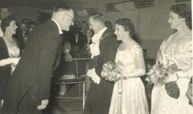 Photograph, Ringwood Mayoral Ball 10th June, 1955. Mayor and Mayoress of Ringwood greeting the Hon. Gilbert Chandler, Minister of Agriculture, and Mrs Chandler.  Also Mrs Kelly on right