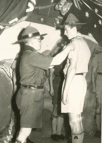 Photograph, Corrie Oke presenting Queen's Scout badge to Andrew Burns