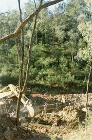 Photograph, Kato digging the 27-foot for the well at the pumping planty at Glenvale Road, North Ringwood, on 10th June 1978