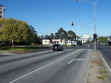 Photograph, Maroondah Highway, looking west, at the coner of Wantirna Road,in 2008. Showing the Clocktower and Haymes Paint (south-west corner)