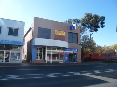 Photograph, Looking east from 2-6 Ringwood Street, near Maroondah Highway intersection on right, in 2008. Former Post Office was located where the small park is located (on right)