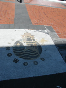 Photograph, City of Ringwood Council logo in Melbourne Street, Ringwood  in 2008, with general view of water feaure and library