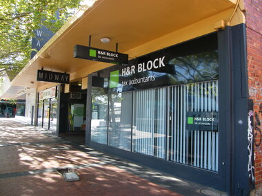 Photograph, Civic Place, Ringwood  in 2008, next to Midway Arcade. Showing H&R Block, tax accountants