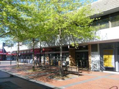 Photograph, Former Commonwealth Bank on Melbourne Street, Ringwood in 2008. Includes other businesses and opens up to Maroondah Highway