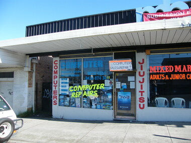 Photograph, Computer repairs shop on Railway Place.  South side of Railway Place