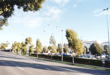 Photograph, Eastland, Ringwood in June 2002, from Warrandyte Road, Ringwood facing west, over the former car park. Showing Safeway (far left) and Myer (right)