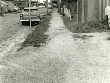 Photograph, Edwin G. Adamson A.R.P.S, Maroondah Highway Central, Ringwood. Adelaide St Footpath - West Side,1963.  (Eastland Litigation Photo), May 1963