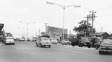 Photograph, Edwin G. Adamson A.R.P.S, Maroondah Highway Central, Ringwood. Looking east from Ringwood Street 1963.  (Eastland Litigation Photo), May 1963