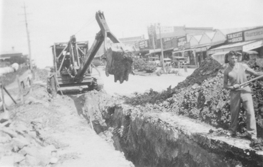 Photograph, Maroondah Highway Central, Ringwood. Laying water main in Main Street, 1935