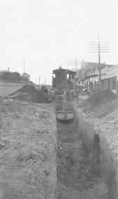 Photograph, Maroondah Highway Central, Ringwood. Laying water main in Main Street, 1935