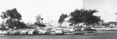 Photograph, Maroondah Highway Central, Ringwood. Car parking on Ringwood oval, c1960's