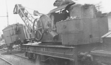 Photograph, Steam crane lifting the Melbourne end of the derailed carriage, circa 1920s