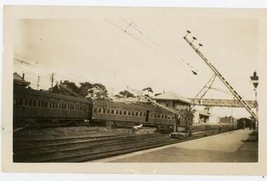 Photograph, Derailed carriage en route to Box Hill being lifted from tracks, 1945