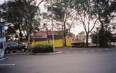 Photograph, Ringwood Railway Precinct circa 2009, shops (including Jimmy's Bar) on east side on station entrance just before demolition