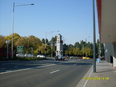 Photograph, Corner of Maroondah Highway and Ringwood Street looking south, Ringwood on 21 April 2009.  Memorial Clocktower in centre