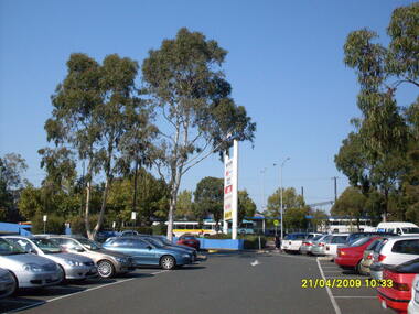Photograph, Looking along the former Adelaide Street, in the Eastland carpark, towards the east, on 21 April 2009. Showing bus terminus across Maroondah Highway