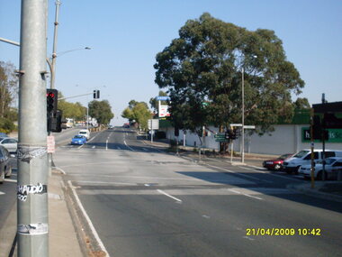 Photograph, Looking west along Maroondah Highway at Warrandyte Road intersection, previously Harris Scarfe shop, on 21 April 2009