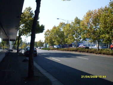 Photograph, Looking east near Maroondah Highway and Warrandyte Road intersection showing shops, on 21 April 2009