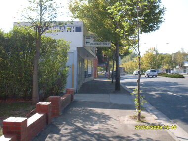 Photograph, Looking west down Maroondah Highway from former Firestation showing McIlwraith Plumbing, on 21 April 2009
