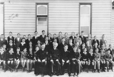 Photograph, Catholic gathering of male students and 4 priests, Ringwood. (Possibly Aquinas College in 1961)