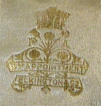 Gold embossed maker's crews on lining of case