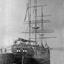 Black and white photograph of a docked Three-masted sailing ship