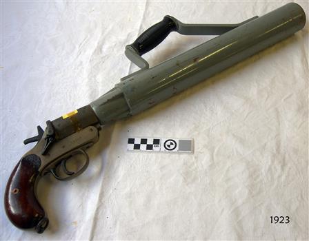 Pistol has a wide barrel and onto which a handle is attached