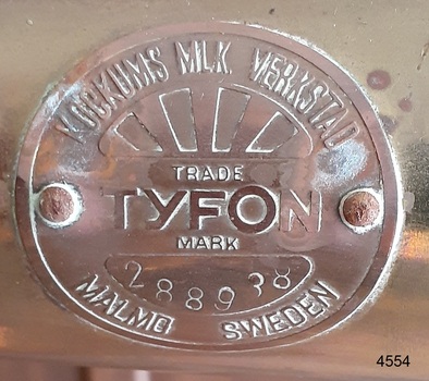 Inscription plate added to body of foghorn