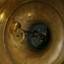 The inside shows the candle pusher inside the stem.