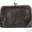 Rectangular black leather purse with metal frame and clasp