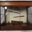 Front is glass, oars are on the back side of the model's case
