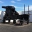 Large cannon on its metal carriage rail