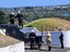 Volunteers 'fire' the cannon on its carriage