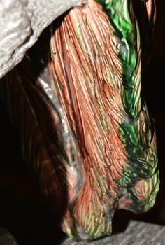 Fine lines and careful painting highlight the feathers