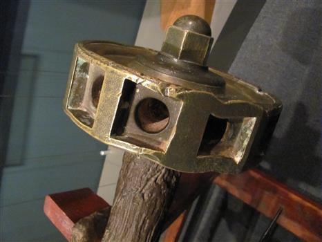 Brass steering wheel hub connected to the metal steering gear