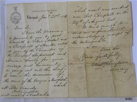 Handwritten document on letterhead paper using ink and pen