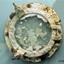 Porthole with class, covered with encrustations