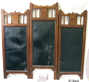 The reverse of the prints is black with white paint splotches