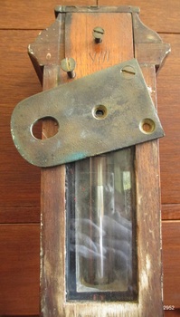 Etched into the timber "VIII" on the back of the timber case of the barometer. Metal fixing bracket is attached.