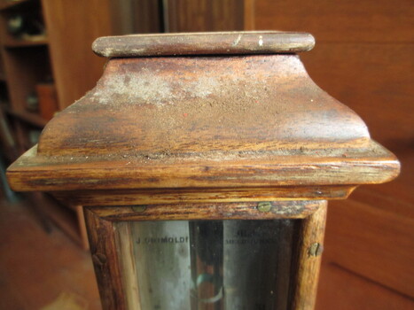 Timber top piece is shaped with curved edges, with a smooth finish