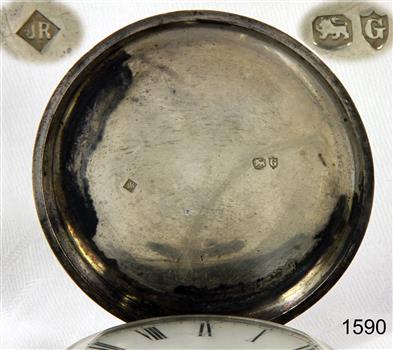 Maker's marks inside the front cover of the watch