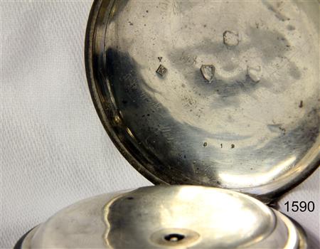 Maker's marks inside the back case of the watch