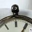 The small winder for the silver cased watch