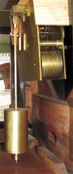 Pendulum is on the left of photo and winding mechanism can be seen also