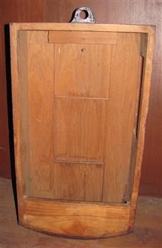 Wooden fitted case for clock, with door opening for winding the nechanism