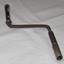 Brass key for clock, shaped for ease of winding