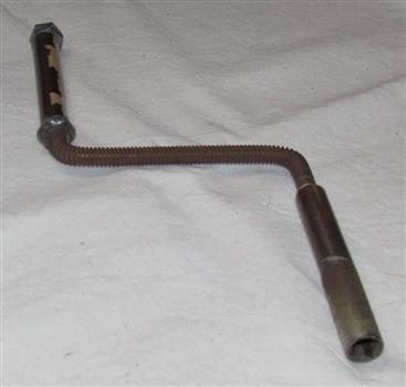 Brass key for clock, shaped for ease of winding