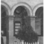 Black and white photograph of the clock in use on the Post Office wall